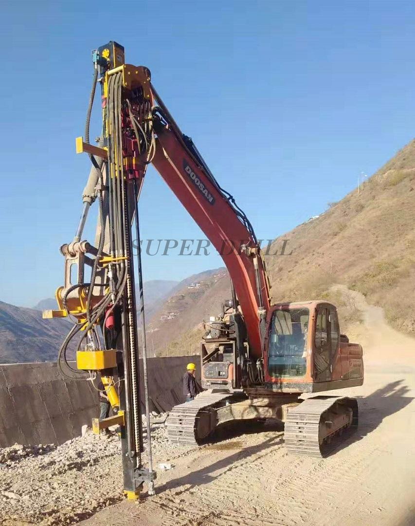 Excavator mounted rock drills